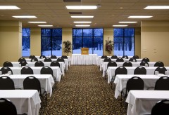 Bayhill Room with chairs and tables setup for a conference