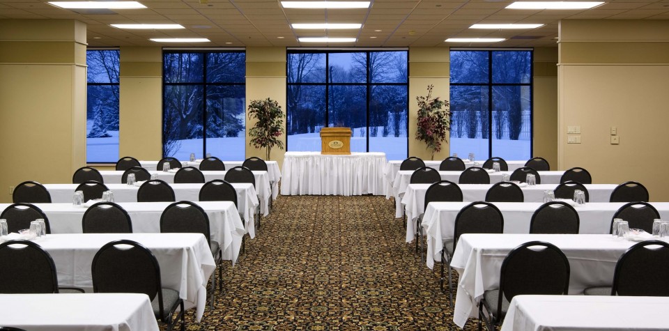 Bayhill Room with chairs and tables setup for a conference