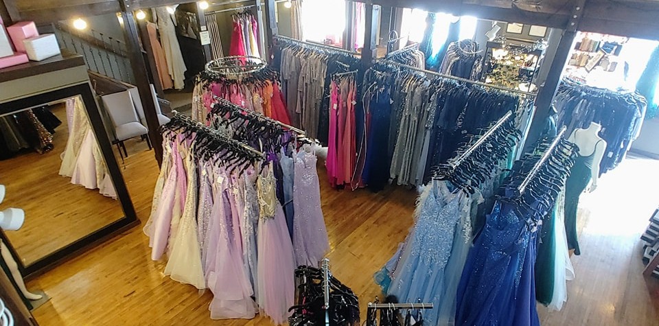 Dresses in many colors including purple, blue, pink, and yellow